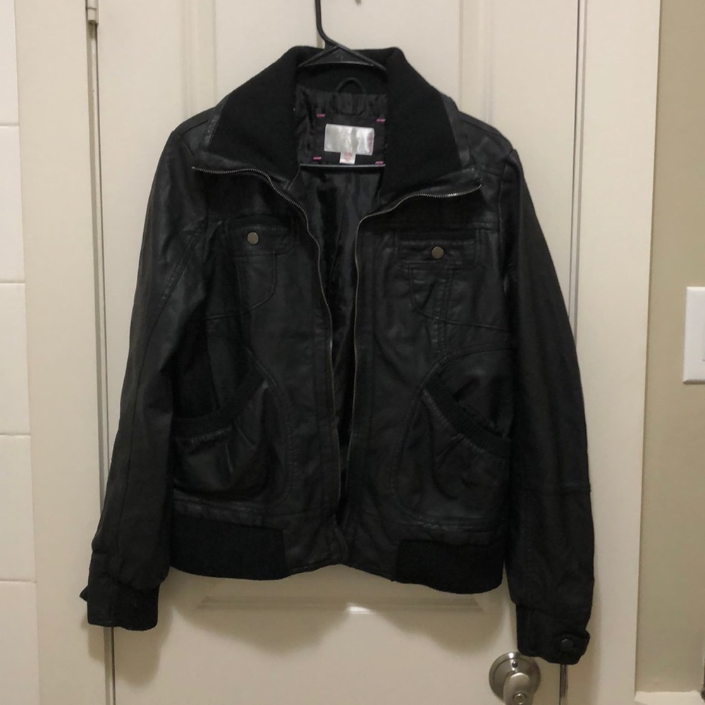 Woman’s black leather jacket